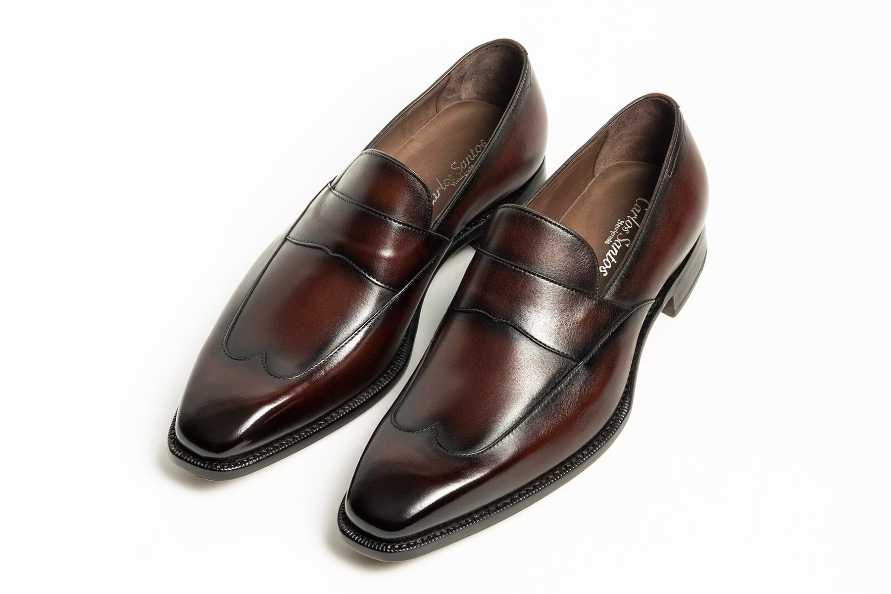 Carlos Santos CS113 Handgrade Austerity Brogue Loafers in Bordo Shadow Patina on a white background.